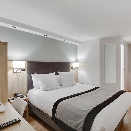 Hotel L'Amandier Nanterre Esterno foto