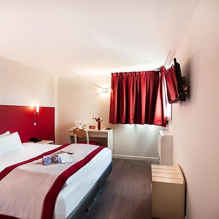 Hotel L'Amandier Nanterre Esterno foto