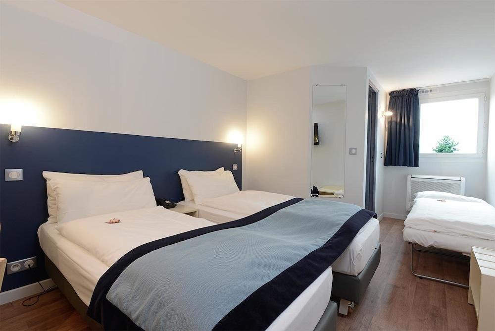 Hotel L'Amandier Nanterre Esterno foto