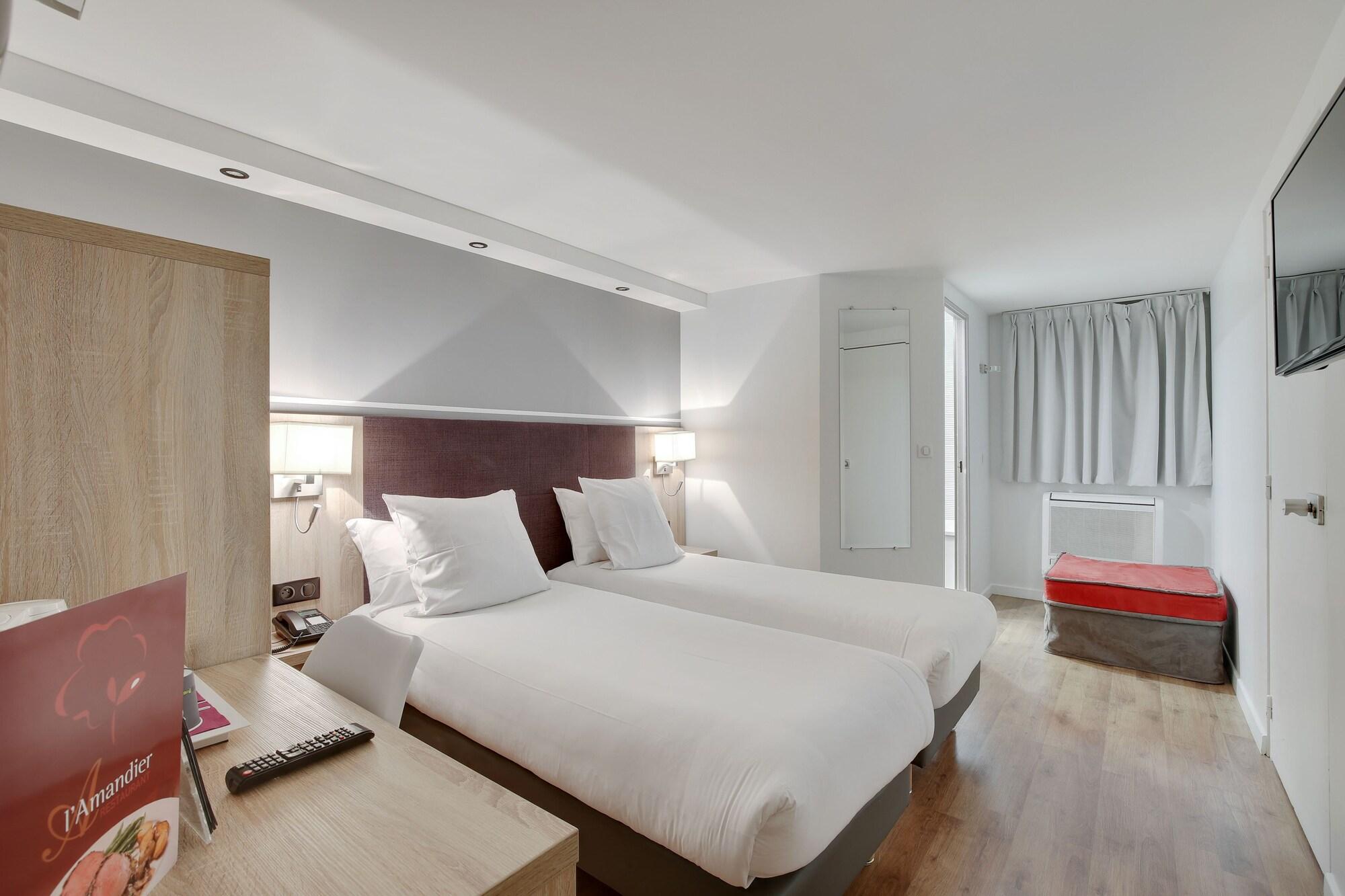 Hotel L'Amandier Nanterre Esterno foto