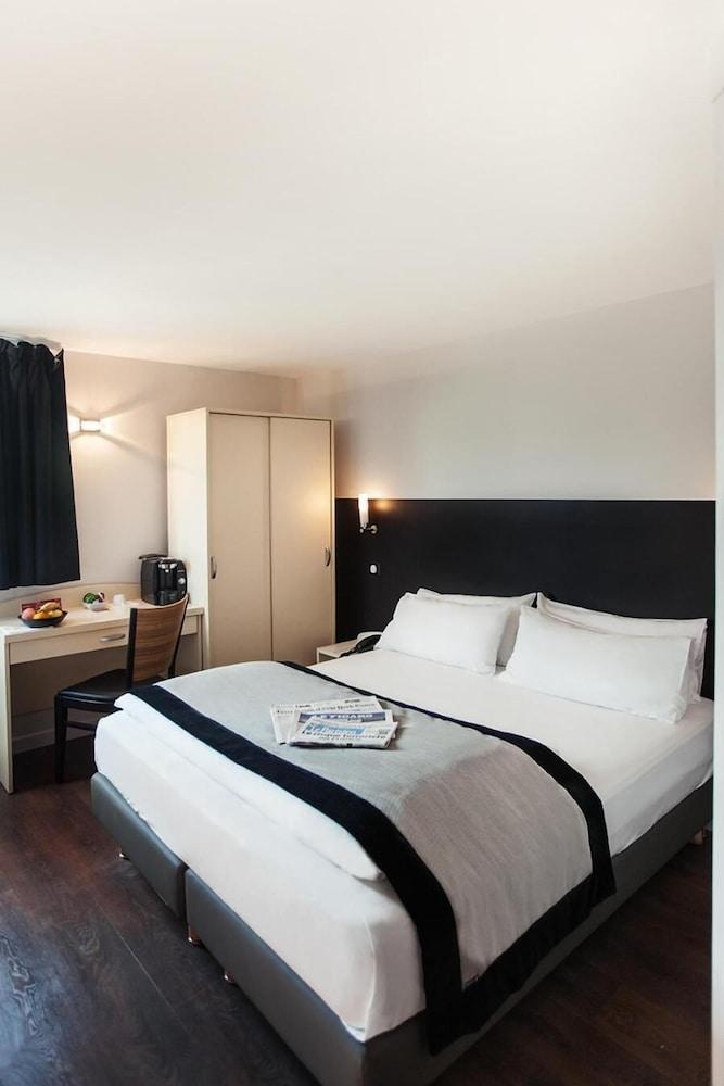 Hotel L'Amandier Nanterre Esterno foto