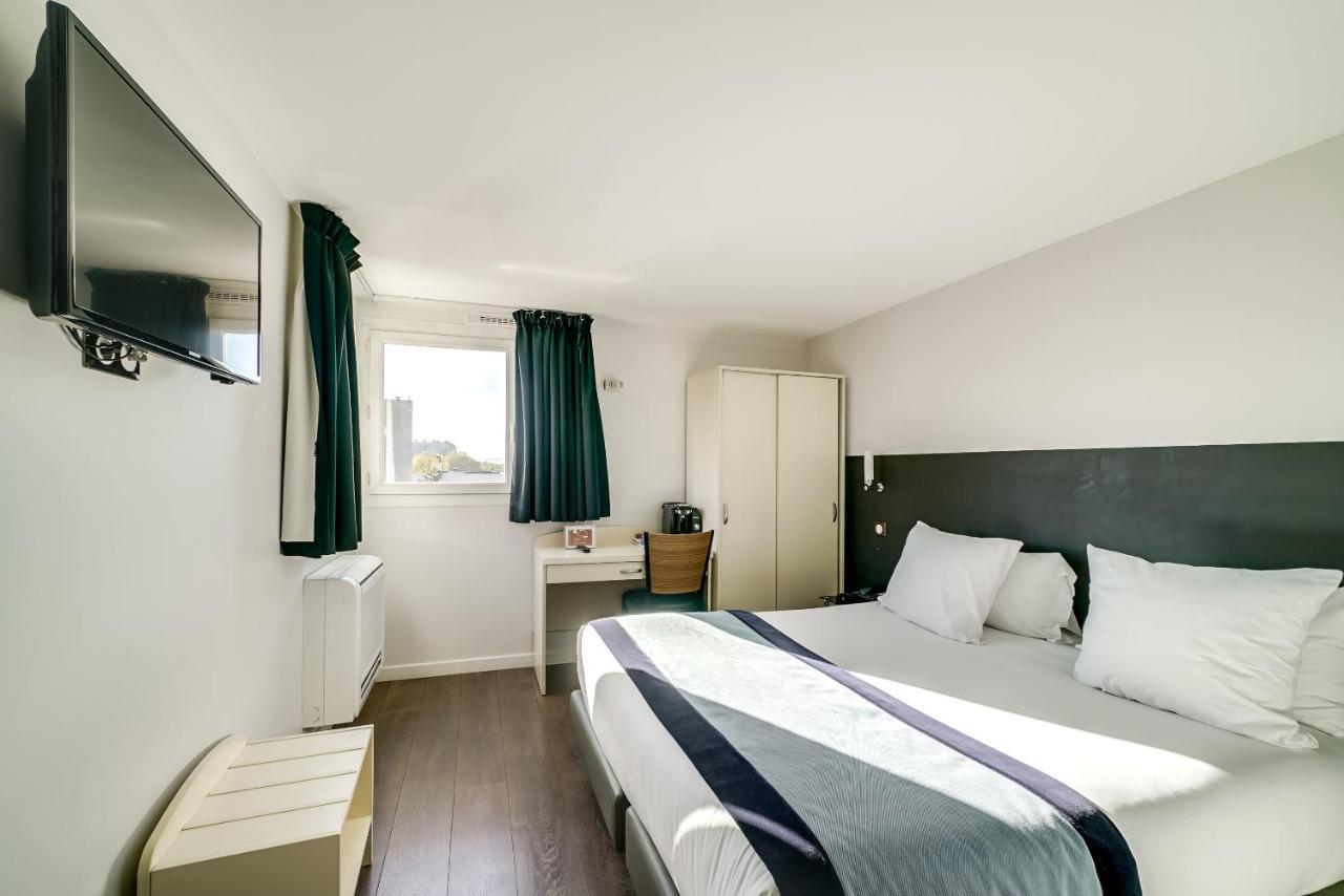 Hotel L'Amandier Nanterre Esterno foto